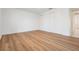 Bedroom featuring modern laminate flooring and closet at 10110 Pepperidge Ct, Tampa, FL 33615