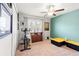 Versatile room featuring an exercise bike, dresser, and ample space for storage or activities at 10512 Fuzzy Cattail St, Riverview, FL 33578
