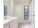 Bathroom with tile floors, shower and bath combo, and frosted window at 107 Halton Cir, Seffner, FL 33584