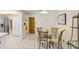 Breakfast area in kitchen with tile flooring, a breakfast nook, and plenty of natural light at 107 Halton Cir, Seffner, FL 33584