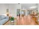 Open floor plan with hardwood floors connecting the living and dining areas at 107 Halton Cir, Seffner, FL 33584