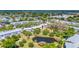 Beautiful aerial view of the community with mature trees and well maintained landscaping around the building at 11224 82Nd Ave # 104, Seminole, FL 33772