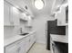 Bright kitchen featuring white cabinets, stainless steel appliances, and updated countertops at 11224 82Nd Ave # 104, Seminole, FL 33772