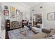 Cozy living room with hardwood floors, stylish decor, and a comfortable seating area at 11723 Gothic Ln, Tampa, FL 33626