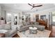 Cozy living room with hardwood floors, comfortable seating, and elegant decor at 11723 Gothic Ln, Tampa, FL 33626