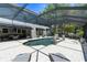 Beautiful screened-in pool featuring plenty of space for dining and relaxing poolside at 11723 Gothic Ln, Tampa, FL 33626