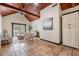Comfortable living room with vaulted ceiling, tile floors, and stylish decor at 118 S Manhattan Ave, Tampa, FL 33609