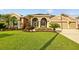 Charming single-story home with a well-manicured lawn and beautiful landscaping at 12009 Wandsworth Dr, Tampa, FL 33626