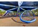 Community playground with a shade canopy, climbing structures, a slide, and soft rubber ground for safety at 12009 Wandsworth Dr, Tampa, FL 33626