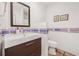 Modern bathroom features a sleek vanity with contemporary fixtures, and artistic decor, for a stylish, functional space at 122 Miramar Ne Blvd, St Petersburg, FL 33704