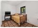 Cozy living area featuring a comfortable daybed, natural light, and minimalist decor for a relaxed atmosphere at 122 Miramar Ne Blvd, St Petersburg, FL 33704