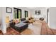 Comfortable living room with stylish decor, ample seating, and natural light at 122 Miramar Ne Blvd, St Petersburg, FL 33704