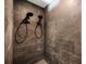 A modern shower featuring dual shower heads, a dark tile surround, and sleek fixtures at 122 Miramar Ne Blvd, St Petersburg, FL 33704