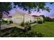 Charming single-story home featuring a well-manicured lawn and attached two-car garage at 12716 Evington Point Dr, Riverview, FL 33579