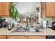 Kitchen sink with stainless steel appliances and access to natural light at 12716 Evington Point Dr, Riverview, FL 33579