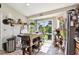 Kitchen featuring tile floor, center island, stainless appliances and a view to outside at 12716 Evington Point Dr, Riverview, FL 33579