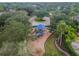 Aerial view of a modern community playground with slides, climbing features, and protective mulch surface at 12716 Evington Point Dr, Riverview, FL 33579