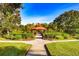 Scenic community gazebo surrounded by manicured landscaping and lush greenery offering a relaxing outdoor space at 14116 Trouville Dr, Tampa, FL 33624