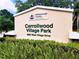 Welcoming entrance to Carrollwood Village Park with lush greenery and clear signage at 14116 Trouville Dr, Tampa, FL 33624