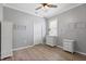 Comfortable bedroom with neutral walls, two dressers, and wood-look flooring at 16104 Bridgedale Dr, Lithia, FL 33547