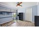 Charming bedroom with a bunk bed, built-in shelving, and a playful rug at 16104 Bridgedale Dr, Lithia, FL 33547
