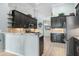 Modern kitchen featuring granite countertops, stainless appliances, and plenty of cabinet space at 16104 Bridgedale Dr, Lithia, FL 33547