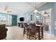 Open-concept living and dining area boasts lots of natural light and outdoor access at 16104 Bridgedale Dr, Lithia, FL 33547