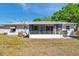 Backyard with a screened in porch area and space for outdoor enjoyment at 1732 63Rd N Ave, St Petersburg, FL 33702