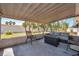 Relaxing screened patio with comfortable seating and a modern fire pit table at 1732 63Rd N Ave, St Petersburg, FL 33702