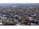 Aerial view of the neighborhood surrounded by mature trees at 1841 Georgia Ave, Palm Harbor, FL 34683