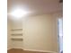 Spacious bedroom offering built-in shelving and neutral paint at 1841 Georgia Ave, Palm Harbor, FL 34683