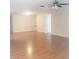 Spacious living room with hardwood floors, neutral walls, and ample natural light at 1841 Georgia Ave, Palm Harbor, FL 34683