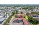 An aerial view of the community showing lush landscaping, tile roofs and easy access to local roads at 19029 Us Highway 19 N # 5-14, Clearwater, FL 33764