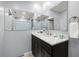 Well-lit bathroom with a vanity and shower with tub at 19029 Us Highway 19 N # 5-14, Clearwater, FL 33764