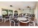 View of the Clubhouse featuring ample seating and a bar area at 19029 Us Highway 19 N # 5-14, Clearwater, FL 33764