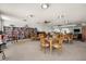 This room features a library, tables and chairs, and a comfortable area for conversations at 19029 Us Highway 19 N # 5-14, Clearwater, FL 33764