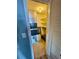 Hall closet with built-in shelving and ample storage space at 1921 58Th N Ave # 11, St Petersburg, FL 33714