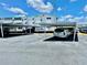 Assigned covered parking lot on a sunny day with clear blue skies at 1921 58Th N Ave # 11, St Petersburg, FL 33714
