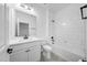 Bathroom features a single sink vanity, a toilet, and a shower/tub combination at 19819 Tattnall Way, Brooksville, FL 34601