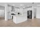 The kitchen features stainless steel appliances and ample counter space making it an excellent place to cook at 19819 Tattnall Way, Brooksville, FL 34601