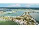 Gorgeous aerial view showcasing waterfront homes with private pools and boat docks at 2010 20Th Avenue Pkwy, Indian Rocks Beach, FL 33785