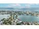 Aerial view of waterfront homes nestled along the ocean in a tranquil neighborhood at 2010 20Th Avenue Pkwy, Indian Rocks Beach, FL 33785