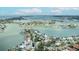Stunning aerial view of waterfront homes with boat docks on a sunny day at 2010 20Th Avenue Pkwy, Indian Rocks Beach, FL 33785