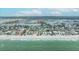 Panoramic aerial view featuring beachfront homes with easy access to the sandy beach at 2010 20Th Avenue Pkwy, Indian Rocks Beach, FL 33785