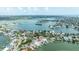 Captivating aerial view of waterfront homes with boat docks and stunning water views at 2010 20Th Avenue Pkwy, Indian Rocks Beach, FL 33785