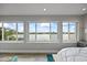 Bright bedroom with water views and stylish decor at 2010 20Th Avenue Pkwy, Indian Rocks Beach, FL 33785