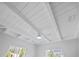 Bedroom ceiling with white beams and ceiling fan at 2010 20Th Avenue Pkwy, Indian Rocks Beach, FL 33785