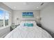 Bedroom with water views, coastal decor, and bright natural light at 2010 20Th Avenue Pkwy, Indian Rocks Beach, FL 33785