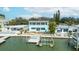 Waterfront house with a dock, patio, and stunning water views; ideal bayside living at 2010 20Th Avenue Pkwy, Indian Rocks Beach, FL 33785
