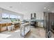 Bright kitchen area with stainless steel appliances and a view of the water at 2010 20Th Avenue Pkwy, Indian Rocks Beach, FL 33785